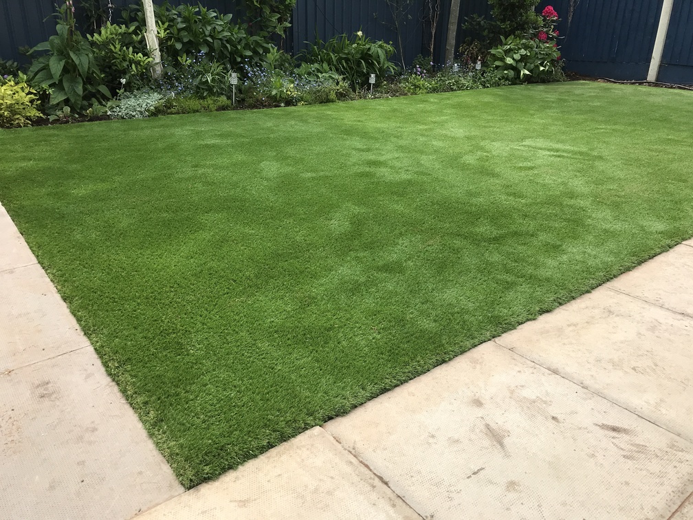 Is Artificial Grass for Playground Surfaces Safe for Kids and Pets